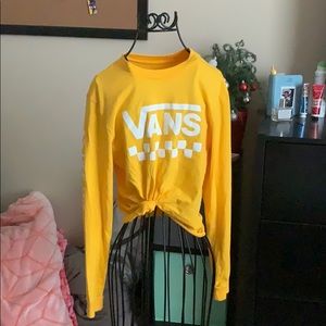 A yellow vans shirt